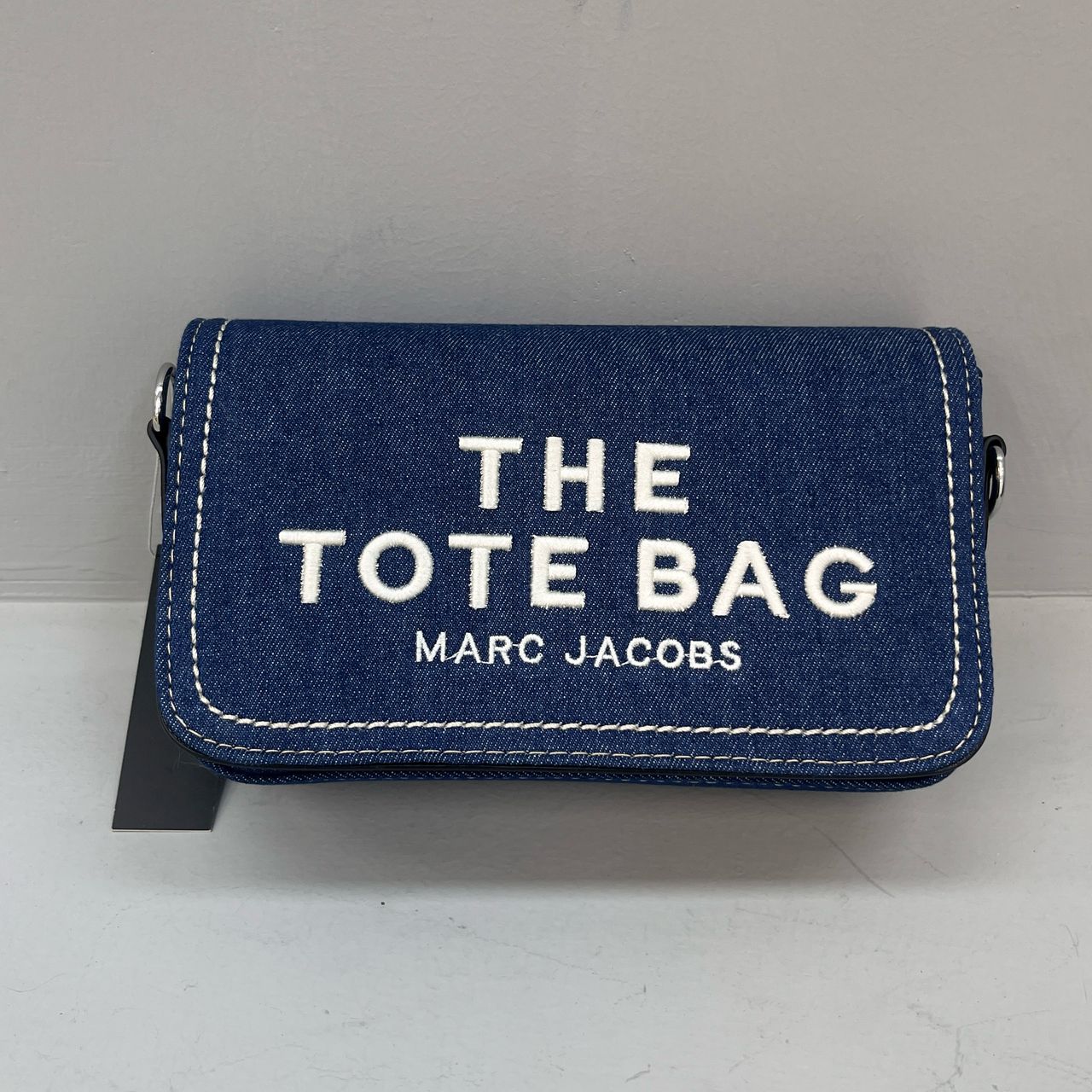Marc Jacobs Denim Mini Crossbody Bag with adjustable strap and embroidered logo